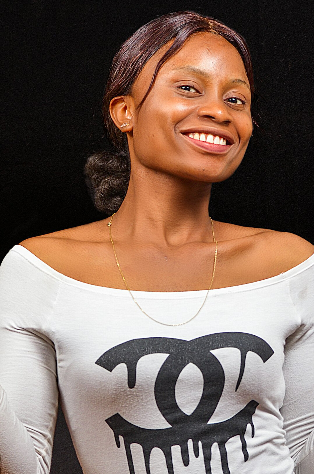 Studio portrait of a young woman smiling