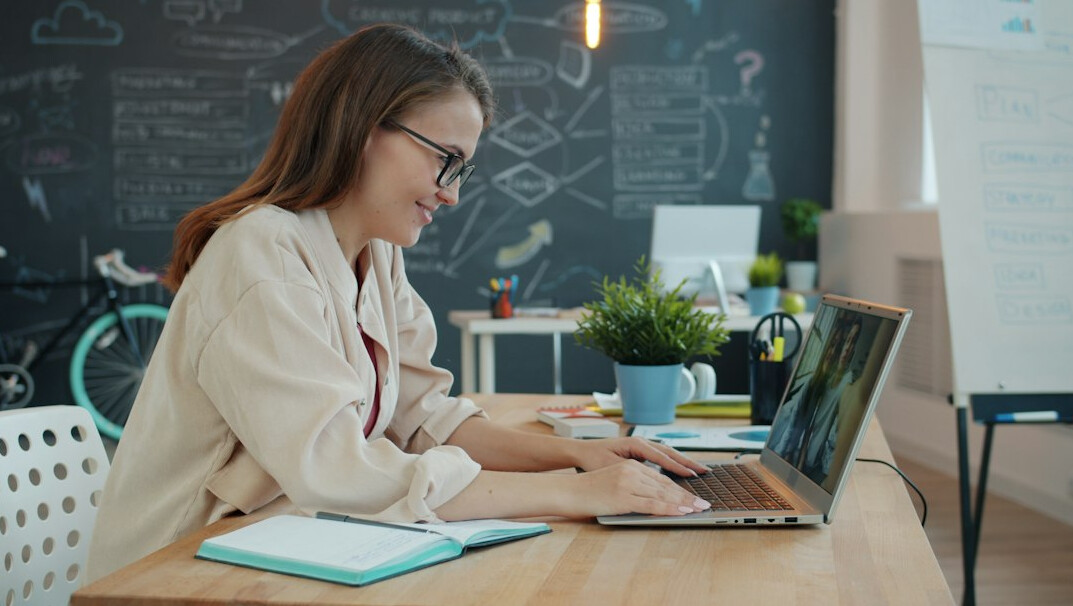 woman attending online course