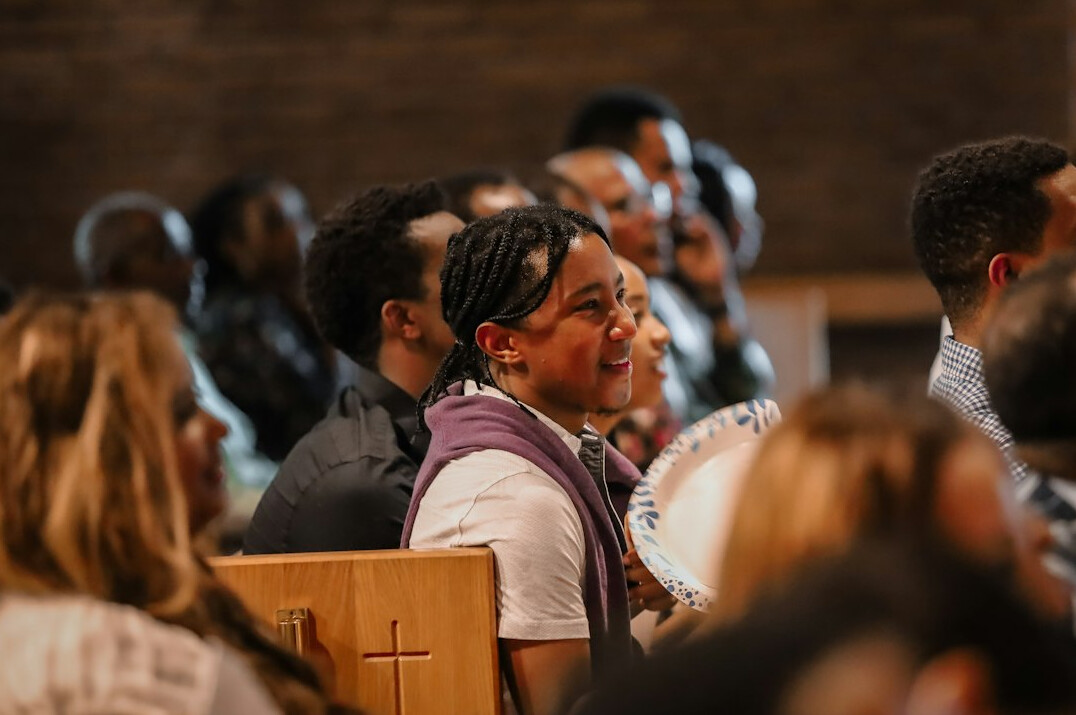Audience listening to a speaker in a seminar room