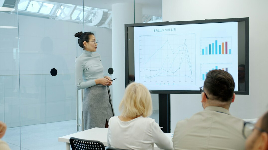 business leader presenting to team