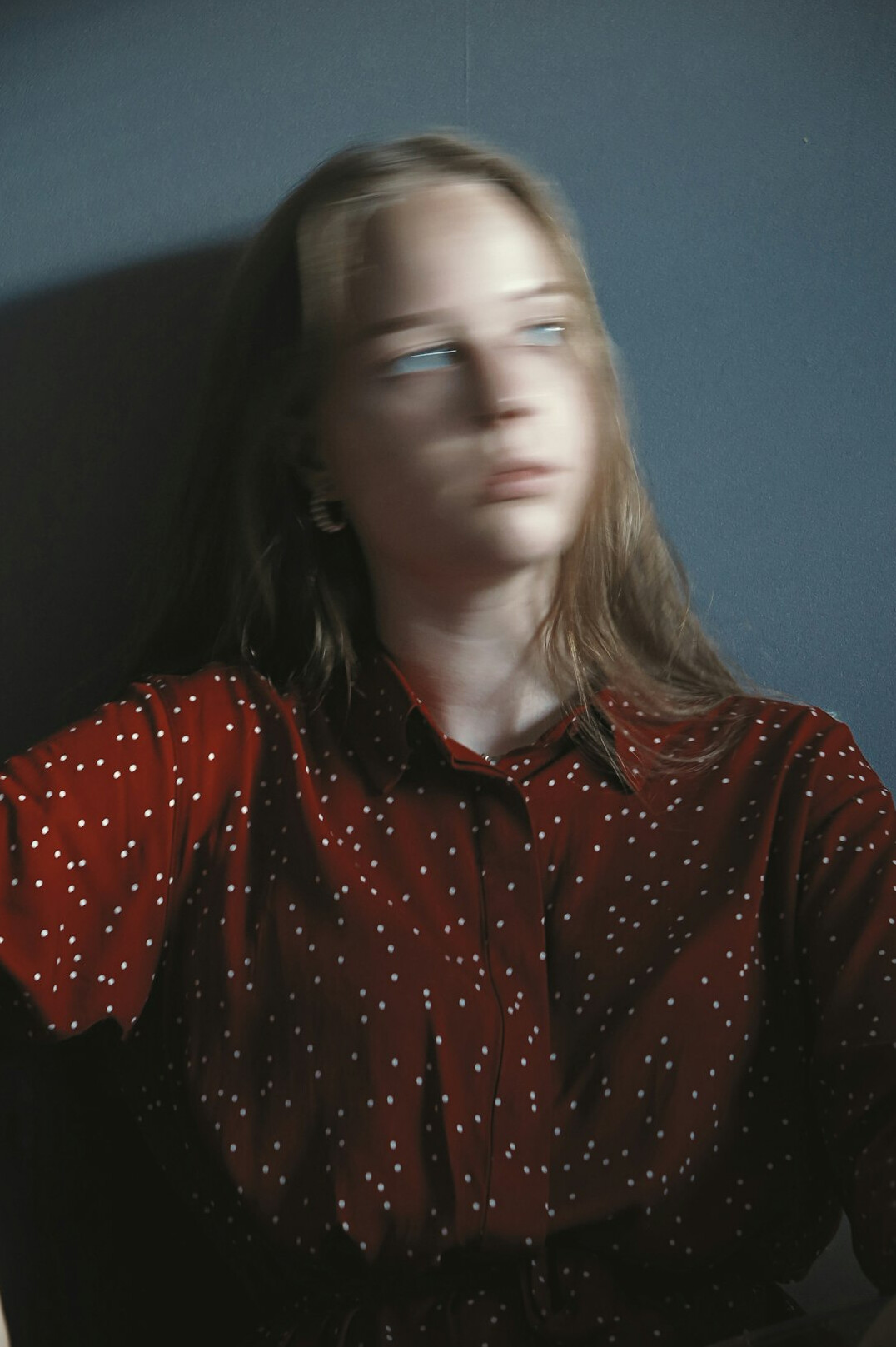 Studio portrait of a man with glasses in a shirt